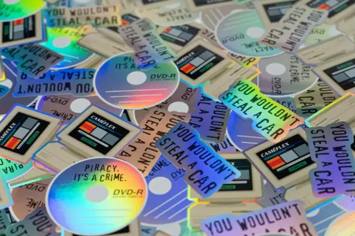 Set of 3 Holographic Stickers “Piracy. It’s a Crime.”